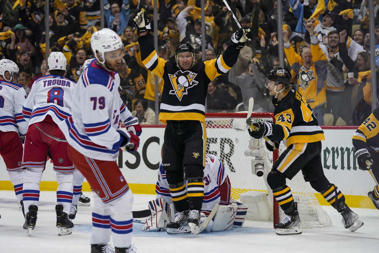 PITTSBURGH, PA - MAY 07: Pittsburgh Penguins center Jeff Carter (77) reacts after scoring a goal past New York Rangers goaltender Igor Shesterkin (31) during the first period in Game Three of the First Round in the 2022 NHL Stanley Cup Playoffs between the New York Rangers and the Pittsburgh Penguins on May 7, 2022, at PPG Paints Arena in Pittsburgh, PA. (Photo by Jeanine Leech/Icon Sportswire via Getty Images)