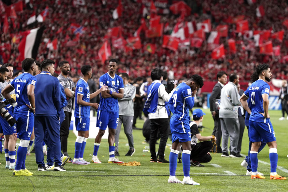 Players of Saudi Arabia's Al Hilal react after their team was defeated by Japan's Urawa Red Diamonds after the AFC Champions League final match at Saitama Stadium in Saitama, near Tokyo, Saturday, May 6, 2023. (AP Photo/Toru Hanai)