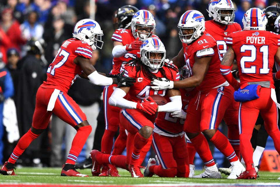 Buffalo Bills middle linebacker Tremaine Edmunds, center, celebrates after intercepting a pass by Baltimore Ravens quarterback Lamar Jackson (8) during the first half of an NFL football game in Orchard Park, N.Y., Sunday, Dec. 8, 2019. (AP Photo/Adrian Kraus)