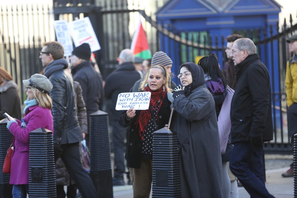 LONDON, UNITED KINGDOM - JANUARY 04 : People take part in an anti-war rally following the killing of Iranian Revolutionary Guards' Quds Force commander Qasem Soleimani by a US airstrike in the Iraqi capital Baghdad, on January 04, 2020 at Downing Street in London, United Kingdom. (Photo by Ilyas Tayfun Salci/Anadolu Agency via Getty Images)