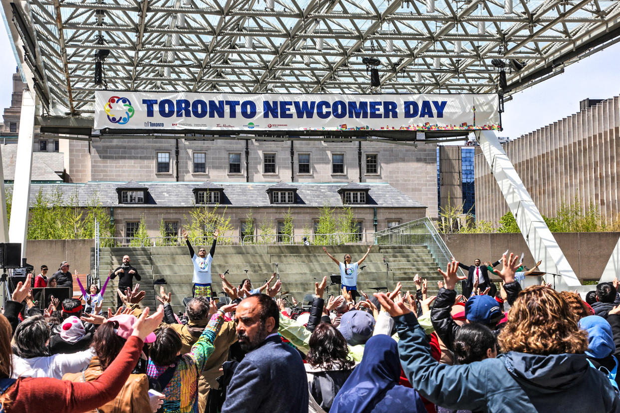 New immigrants to Canada and new Canadians take part in the 5th Annual Newcomer Day at Nathan Philips Square in Toronto, Ontario, Canada, on May 16, 2019.  (NurPhoto via Getty Images file)