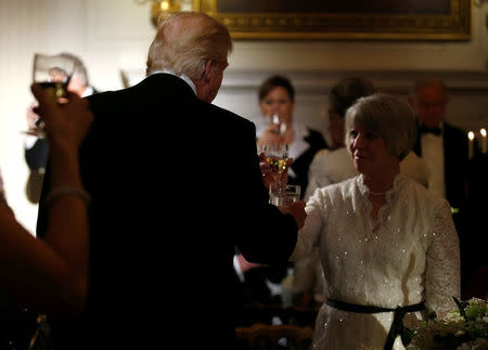 U.S. President Donald Trump toasts with a guest during the Governor's Dinner in the State Dining Room at the White House in Washington, U.S., February 26, 2017. REUTERS/Joshua Roberts