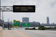 <p>Signs warning of road closures are seen above the road in Miami Beach, Fla., Sept. 8, 2017. (Photo: Bryan Woolston/Reuters) </p>