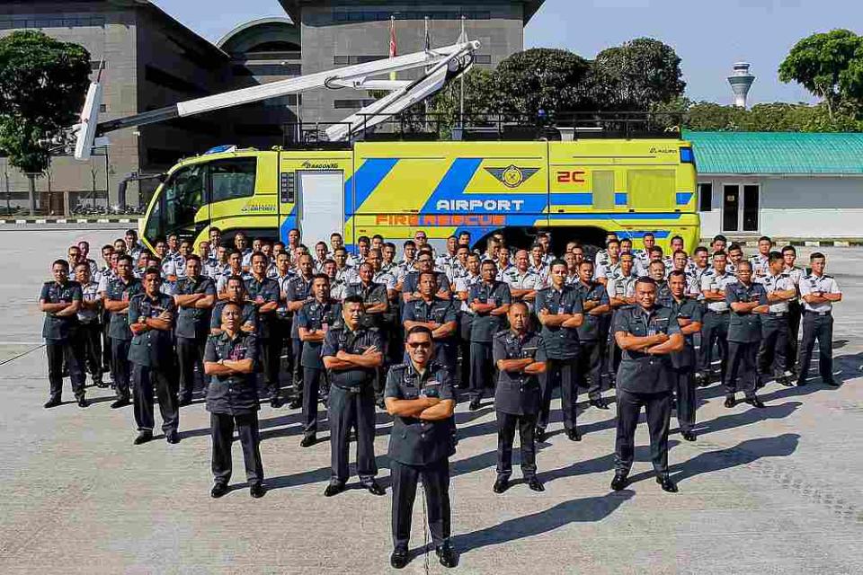 You will have an opportunity to take pictures with these men when you sign up for Malaysia Airports' 'Airport Staycation' this weekend. — Photo via Facebook/  Airport Fire and Rescue Service-AFRS, KLIA