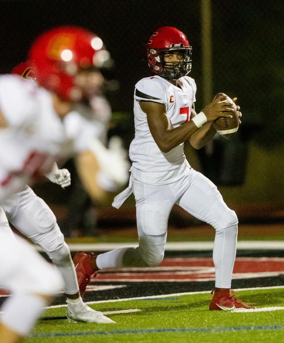 Chaparral quarterback Marcel Jones (7) runs with the ball at Desert Mountain High School’s football field in Scottsdale on Sept. 8, 2023.