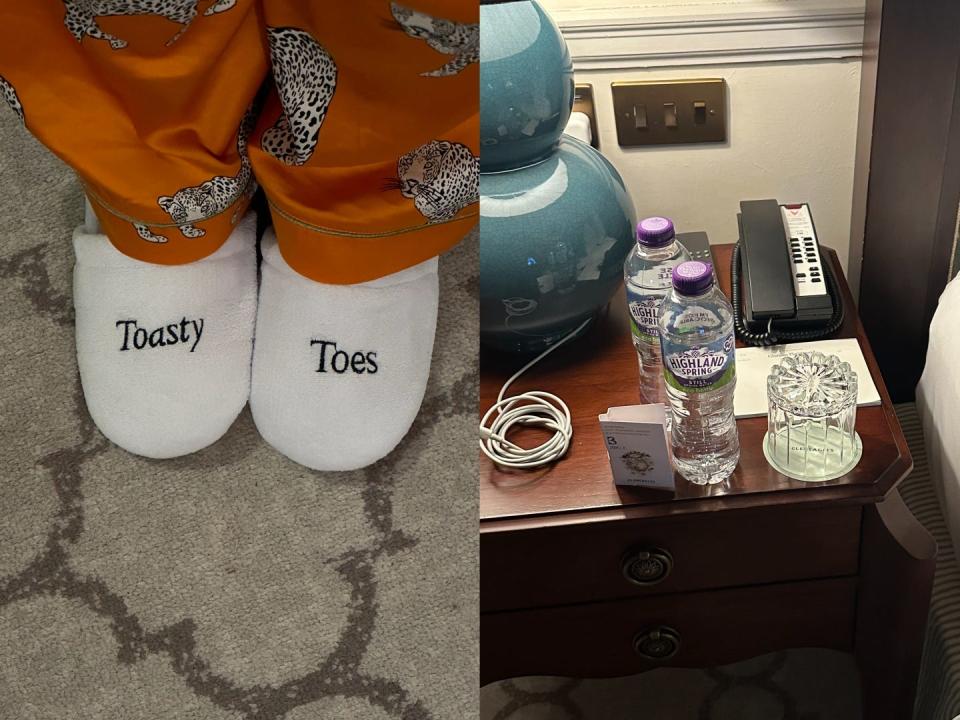 A top view of someone wearing slippers and orange pyjamas (left), a bedside table with bottles of water, a charger, landline phone and glass (right)