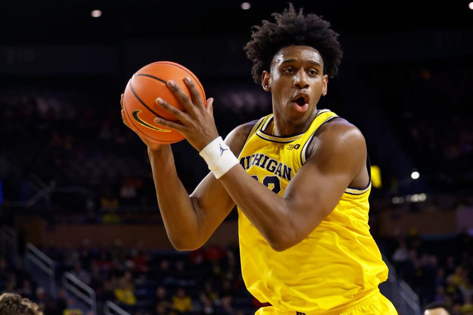 Michigan forward Tarris Reed Jr. grabs the rebound in the second half of U-M's 72-68 win on Wednesday, Feb. 7, 2024, at Crisler Center.