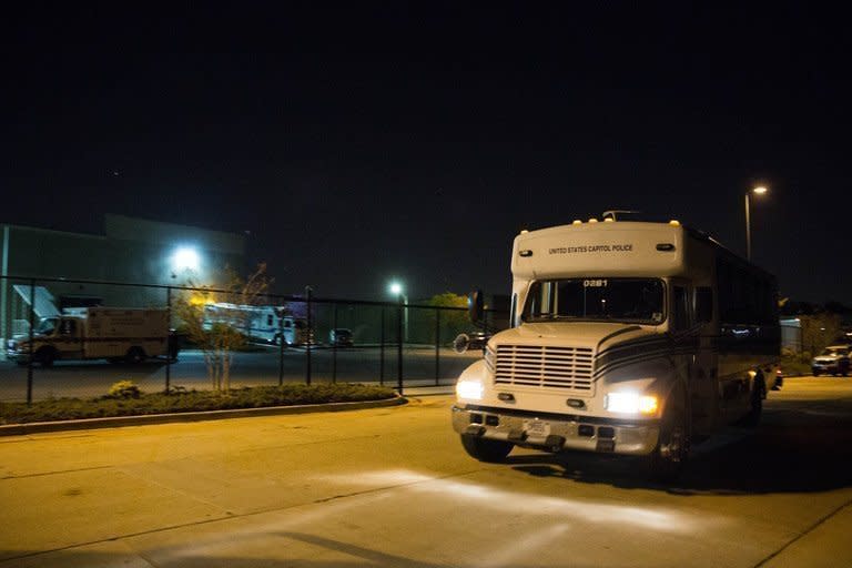 A US Capitol Police van leaves a mail sorting facility on April 16, 2013, in Hyattsville, Maryland. The poisoned mail episodes recalled the mysterious series of letters laced with anthrax sent to lawmakers and some journalists, which killed five people and sickened 17 others, following the September 11 attacks in 2001