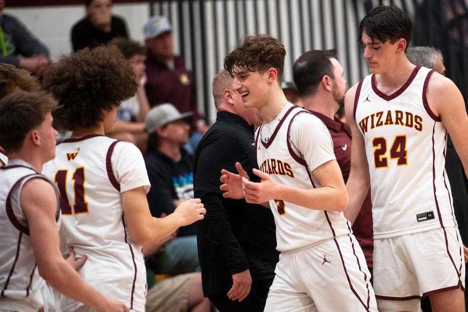 Windsor's Madden Smiley celebrates as he comes out of the game during the 5A basketball playoffs against Standley Lake at Windsor High School in Windsor, Colo., on Wednesday, Feb. 21, 2024.