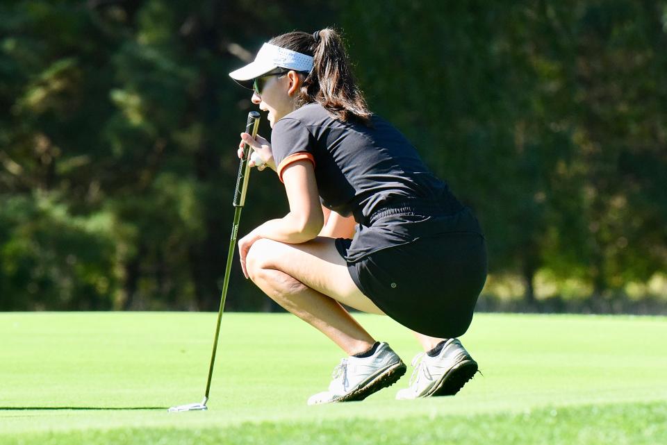 Brighton's Amelia Gatti shot 79 to tie two teammates for third place in the KLAA postseason golf tournament Friday at Kensington Metropark Golf Course.