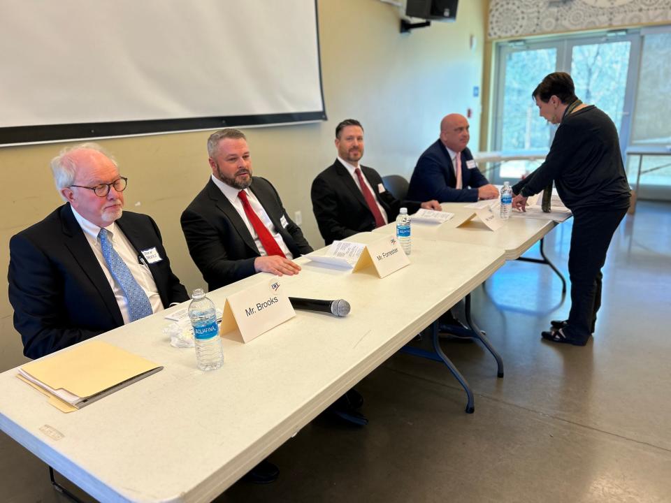 The four Republicans who are seeking the Anderson County chancellor seat spoke at a League of Women Voters of Oak Ridge forum on Feb. 6, 2024. Seated from left are candidates Jamie Brooks, the current chancellor, Daniel Forrester, Evan Hauser and Roger Miller. Standing is the League's Mary Ann Reeves.