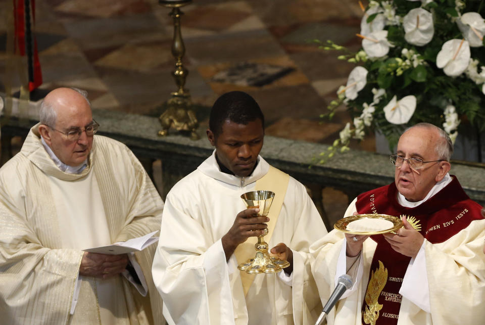 Pope Francis celebrates a mass with the Jesuits on the occasion of the order's titular feast, in Rome's Jesus' Church, Friday, Jan. 3, 2014. (AP Photo/Riccardo De Luca)