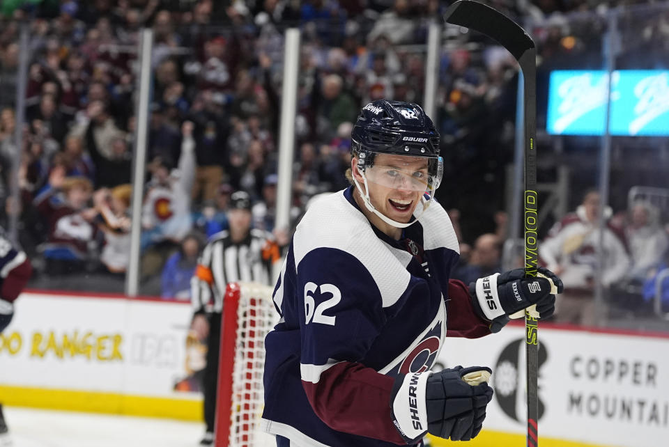 Colorado Avalanche left wing Artturi Lehkonen reacts after scoring a goal against Minnesota Wild goaltender Filip Gustavsson in the first period of an NHL hockey game Friday, March 8, 2024, in Denver. (AP Photo/David Zalubowski)