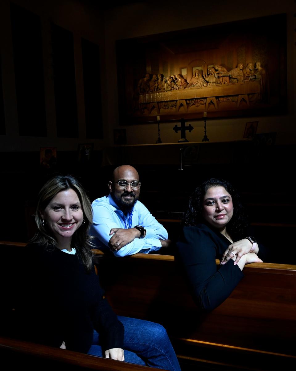 United Methodist Church administrative staff members Caitlin Congdon, left, Sandeep Kuntam, and Sharah Dass at the Upper Room Chapel Wednesday, April 3, 2024, in Nashville, Tenn. The GCFA staff have been working with United Methodist regional conferences and other general agencies that are navigating budget cuts and administrative consolidation. The denomination's top legislative assembly, the UMC General Conference, is meeting in Charlotte starting April 22.