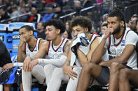 Gonzaga players react from the bench in the second half of an Elite 8 college basketball game against UConn in the West Region final of the NCAA Tournament, Saturday, March 25, 2023, in Las Vegas. (AP Photo/David Becker9