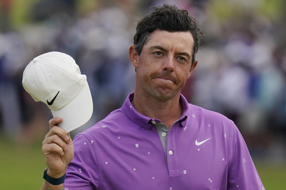 Rory McIlroy, of Northern Ireland, tips his cap after finishing on the 18th green during the final round of the U.S. Open Golf Championship, Sunday, June 20, 2021, at Torrey Pines Golf Course in San Diego. (AP Photo/Gregory Bull)