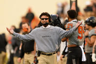 Oklahoma State head coach Mike Gundy gestures to an official during the last quarter of an NCAA college football game Saturday, Oct. 24, 2020, in Stillwater, Okla. (AP Photo/Brody Schmidt)