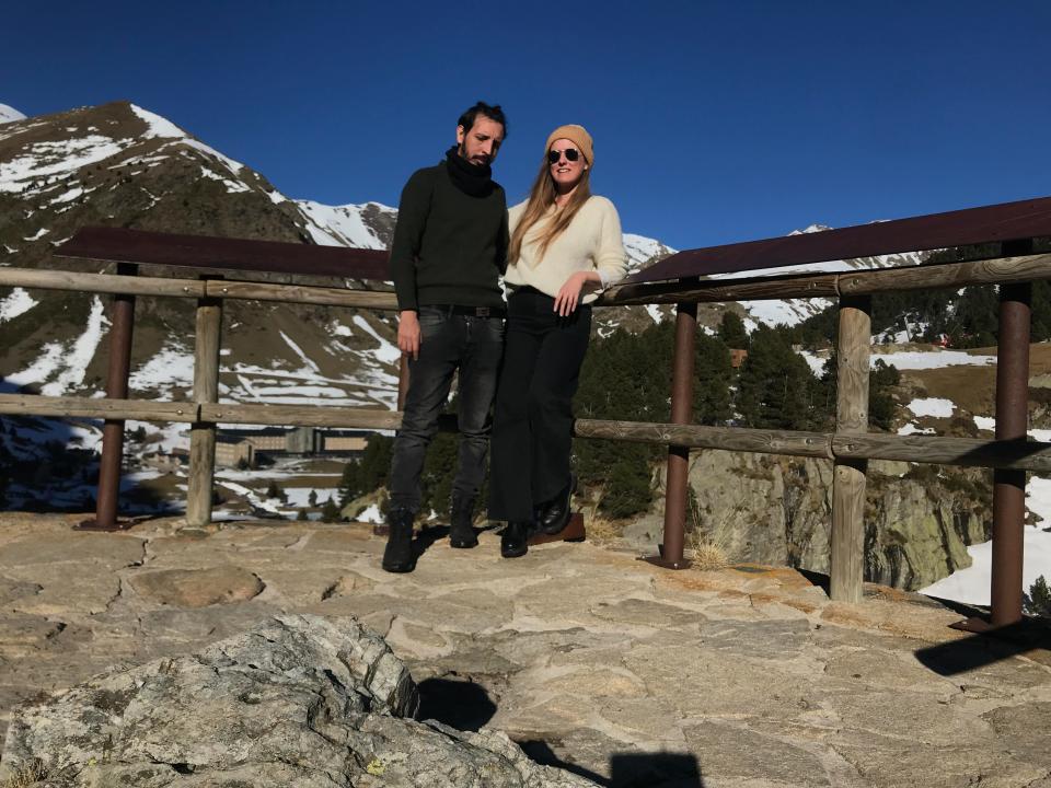 Jordan Mautner and her partner standing in front of mountain