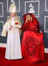 <p>We know Nicki likes to dress up, but the rapper raised eyebrows when she attended the Grammys on the arm of a pope. <i>(Photo: Getty Images)</i> </p>