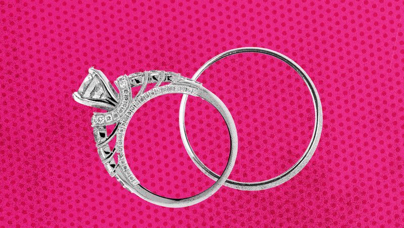 Two rings against a pink background. 