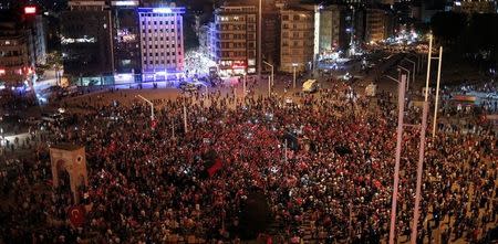 Supporters of Turkish President Tayyip Erdogan gather on Taksim square in Istanbul, Turkey, July 16, 2016. REUTERS/Alkis Konstantinidis