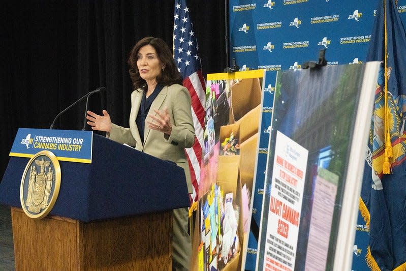 Gov. Kathy Hochul speaks at a press conference unveiling the results of a state crackdown on illegal cannabis businesses, including 1,000 pounds of seized illicit marijuana.