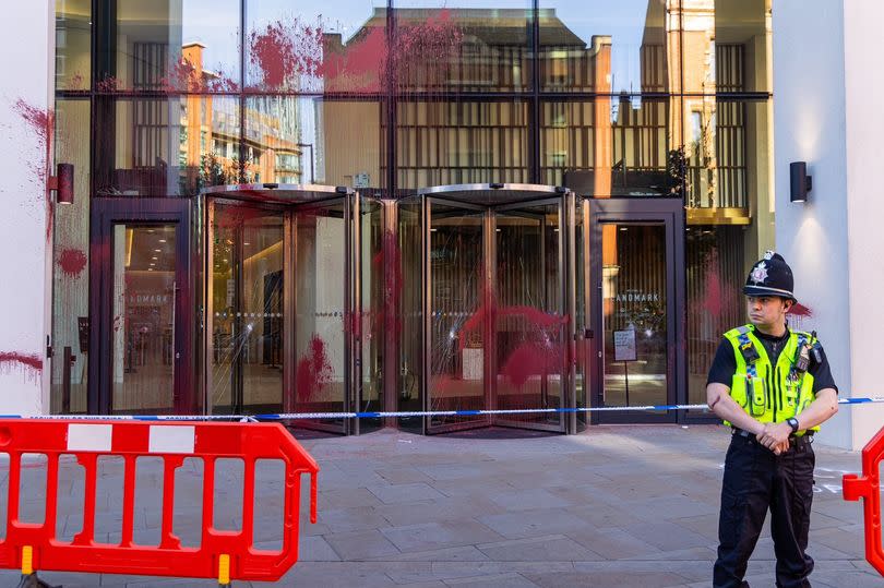 Police at the scene outside the J.P. Morgan offices in Manchester