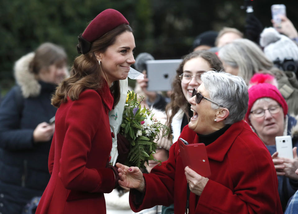 Britain's Kate, Duchess of Cambridge smiles as she meets members of the crowd after attending the Christmas day service at St Mary Magdalene Church in Sandringham in Norfolk, England, Tuesday, Dec. 25, 2018. (AP PhotoFrank Augstein)