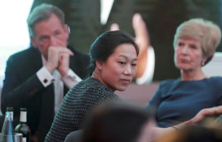 Priscilla Chan (C), wife of Facebook founder and CEO Mark Zuckerberg, attends the awards ceremony of the newly established Axel Springer Award in Berlin, Germany, February 25, 2016. REUTERS/Kay Nietfeld/Pool