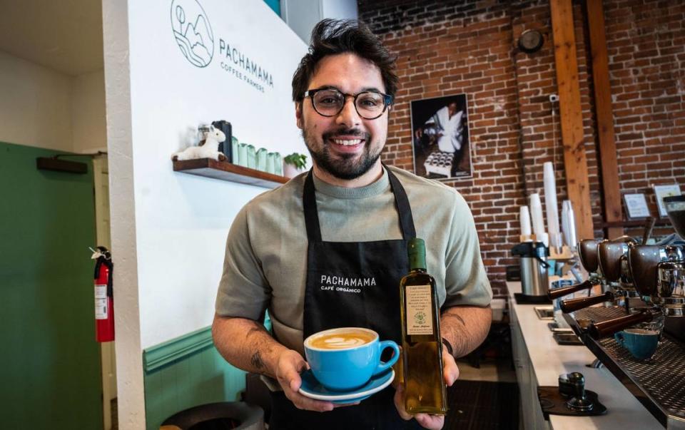 Cruz Conrad of Pachamama Café Orgánico demonstrates the making of olive oil lattes on Tuesday. The olive oil is sourced from Pasture 42 in Yolo County.