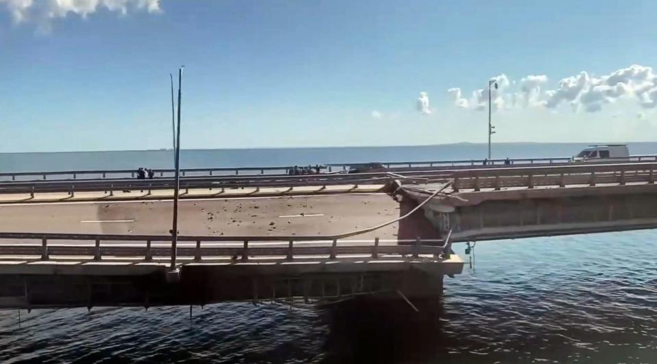 This video grab taken from a Crimea24TV footage on July 17 shows the damaged Kerch bridge linking Crimea to Russia.