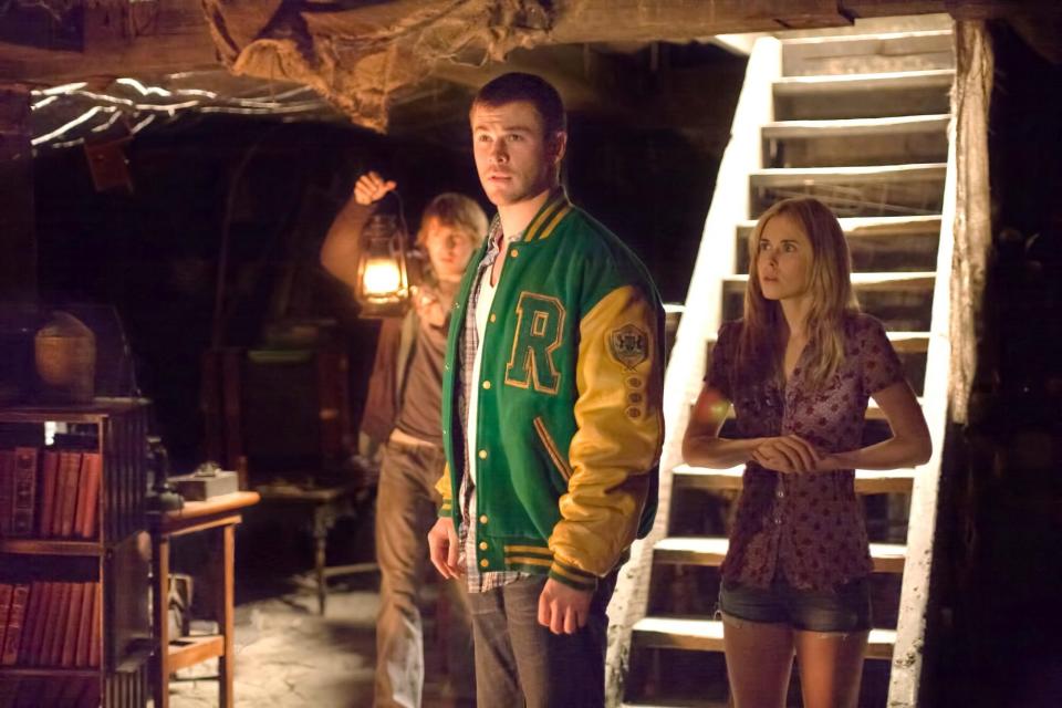 THE CABIN IN THE WOODS, from left: Fran Kranz, Chris Hemsworth, Anna Hutchison, 2012. ph: Diyah Pera