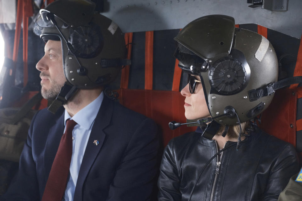 Estonian Prime Minister Kaja Kallas, right, and British Ambassador to Estonia Ross Allen fly back from NATO exercises in southern Estonia, Wednesday, May 15, 2024. Both the U.K. and Estonia recently announced they have arrested people on suspicion of organizing sabotage operations on behalf of Russia. (AP Photo/Hendrik Osula)