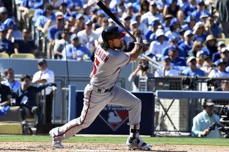 Washington Nationals third baseman Anthony Rendon (6) hits a two run home run during the third inning against the Los Angeles Dodgers in game three of the 2016 NLDS playoff baseball series at Dodger Stadium. Mandatory Credit: Richard Mackson-USA TODAY Sports