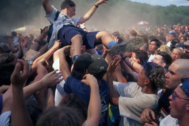 <p>Bill Tompkins/Getty</p> Lollapalooza in June 1993 in New York City