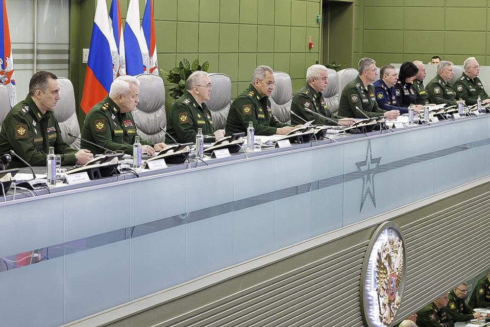 In this handout photo released by Russian Defense Ministry Press Service on Tuesday, Jan. 10, 2023, Russian Defense Minister Sergei Shoigu, center, speaks during a meeting with Russian hight level officers in Moscow, Russia. (Russian Defense Ministry Press Service via AP)