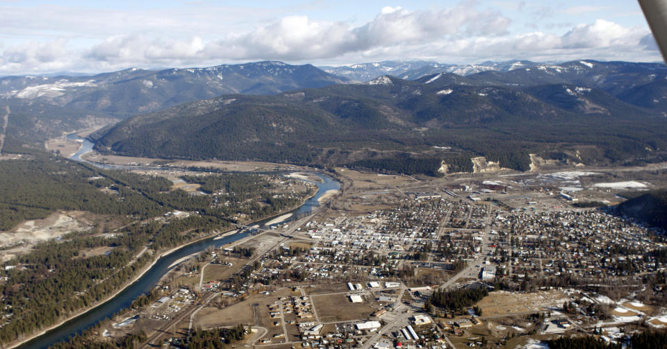 FILE - This Feb. 17, 2010 file photo shows the town of Libby, Mont. W.R. Grace, Inc., the chemical company blamed for polluting Libby, Mont. with asbestos dust that has killed hundreds of people, is pushing back against the Environmental Agency proposal and seeking to have it revised. Attorneys and scientists for W.R. Grace Inc., which operated an asbestos mine in Libby for three decades, say the EPA proposal would frustrate cleanup efforts by setting an unattainable standard for exposures. (AP Photo/Rick Bowmer, File)