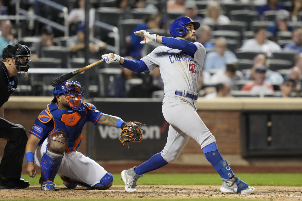 Chicago Cubs' Mike Tauchman hits a solo home run off New York Mets relief pitcher Drew Smith in the eighth inning of a baseball game, Tuesday, Aug. 8, 2023, in New York. (AP Photo/John Minchillo)