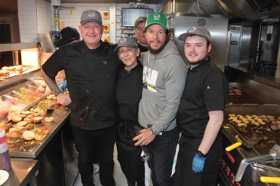 Wahlberg co-owns fast food chain Wahlburgers with his brothers (Dave Benett)