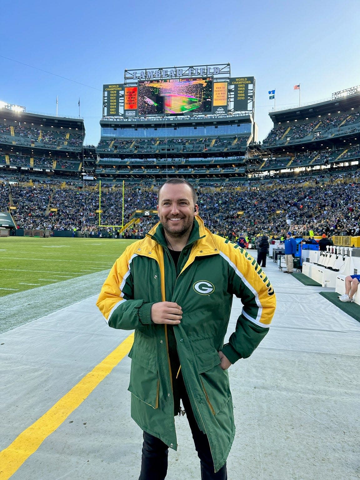 Country music artist Stephen Ray wore one of his dad's old Green Bay Packers parkas when he sang the national anthem at Lambeau Field for the New Year's Day game against the Minnesota Vikings. His dad is Steve Mariucci, who was the Packers quarterbacks coach under Mike Holmgren during the 1990s.