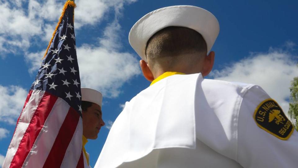 U.S. Naval Sea Cadets Louis DiModica, 15, left and Jeffrey Garino, 14, participate in a Memorial Day ceremony at San Luis Cemetery Mausoleum and Memorial Gardens in San Luis Obispo in 2019.