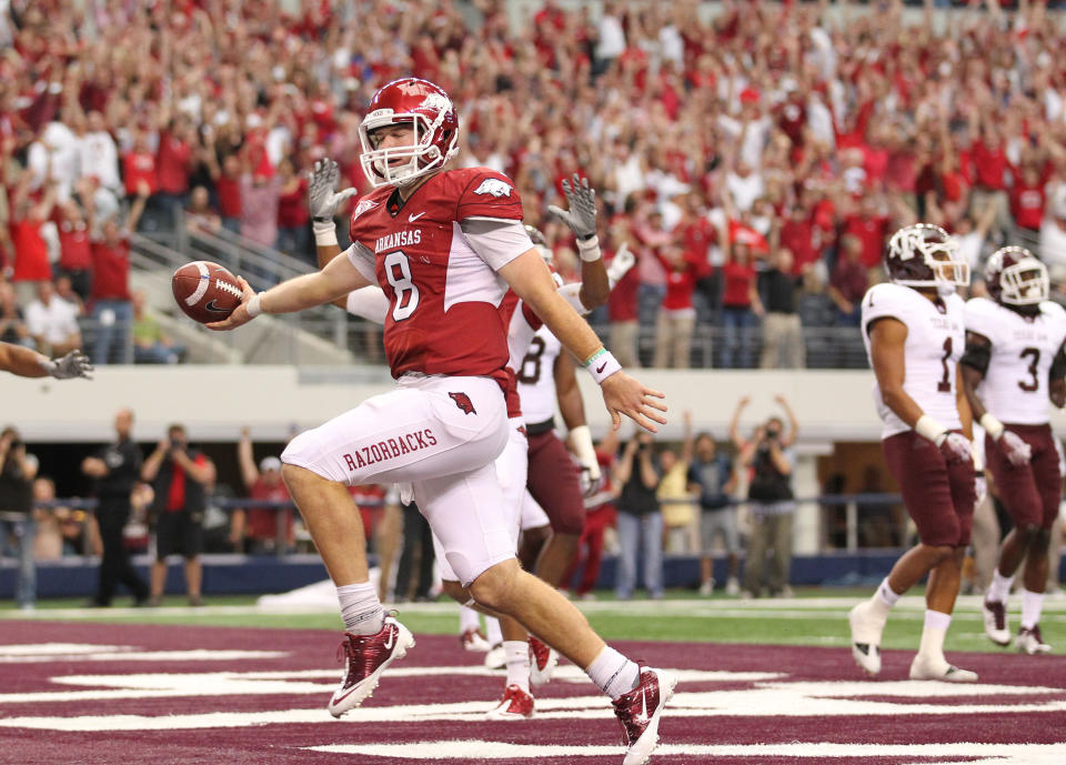 Oct 1, 2011; Arlington, TX, USA; Arkansas Razorbacks quarterback Tyler Wilson (8) runs for a two point conversion to tie the game in the fourth quarter against the Texas A&M Aggies at Cowboys Stadium. The Razorbacks beat the Aggies 42-38. Mandatory Credit: Matthew Emmons-USA TODAY Sports