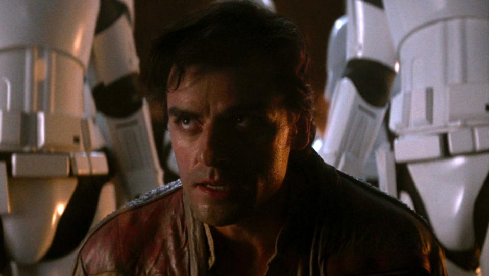 Oscar Isaac knelt in defiance as he's held captive in Star Wars: The Force Awakens.