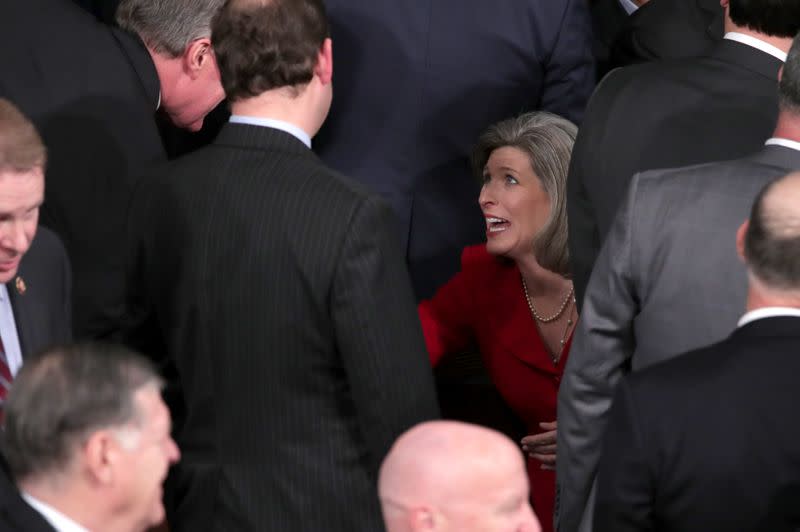 U.S. Senator Ernst (R-IA) greets guests prior to U.S. President Trump delivering State of the Union address at the U.S. Capitol in Washington