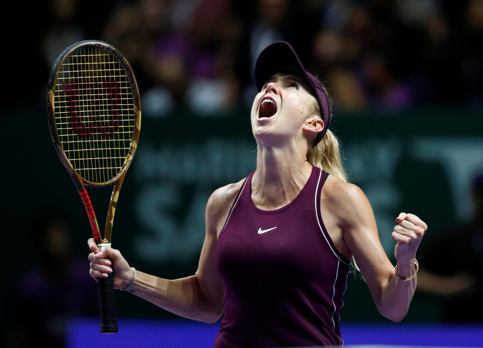 Elina Svitolina roars in delight after winning her WTA Finals Singapore semi-final clash against Kiki Bertens on 27 October, 2018. (PHOTO: Reuters/Edgar Su)