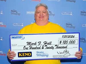Man claims $4 million lottery prize with dog, plans donation for