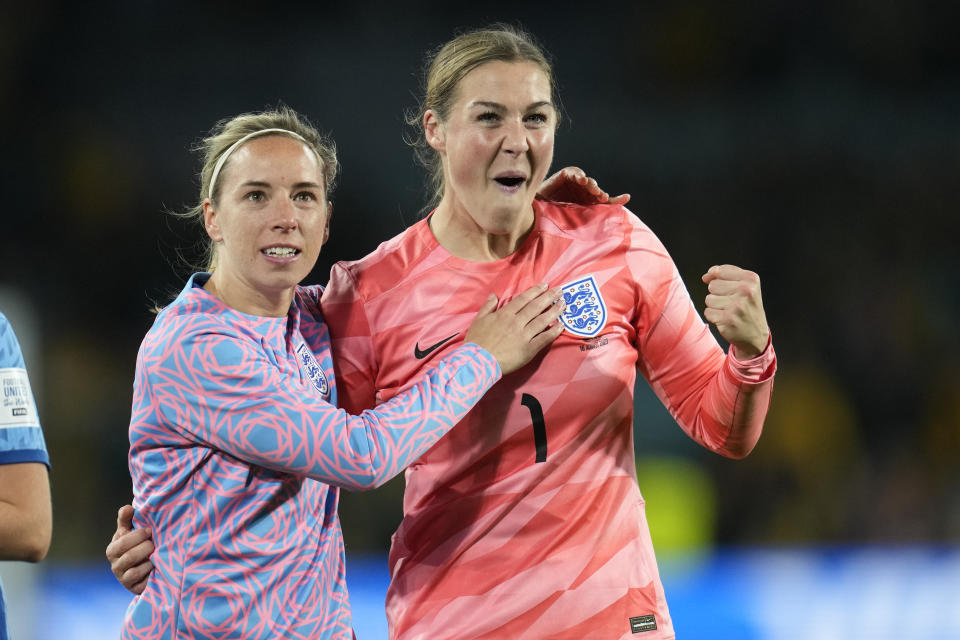 England's goalkeeper Mary Earps, right, and Jordan Nobbs celebrate as they won the Women's World Cup semifinal soccer match between Australia and England at Stadium Australia in Sydney, Australia, Wednesday, Aug. 16, 2023. (AP Photo/Abbie Parr)