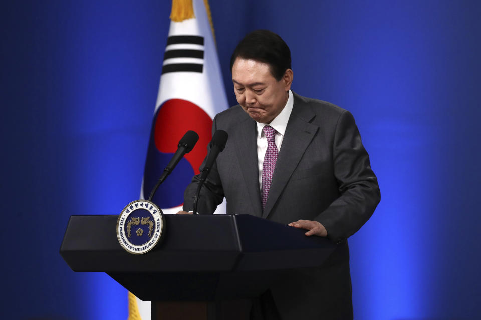 South Korean President Yoon Suk Yeol pauses as he delivers a speech during a news conference to mark his first 100 days in office at the presidential office in Seoul, South Korea, Wednesday, Aug. 17, 2022. Yoon said Wednesday his government has no plans to pursue its own nuclear deterrent in the face of growing North Korean nuclear threats, as he urged the North to return to dialogue aimed at exchanging denuclearization steps for economic benefits. (Chung Sung-Jun/Pool Photo via AP)