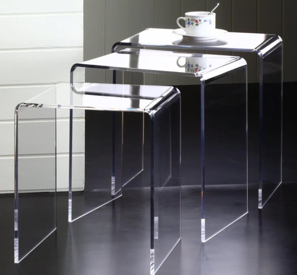 three clear nesting tables