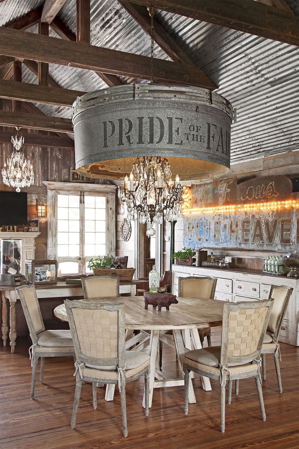 repurposed chandelier in a rustic dining room